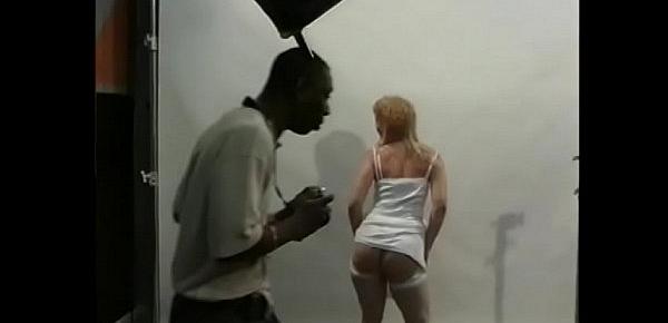  After the photo shoot, a black guy fucks a curly blonde with a cool ass in all positions